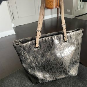 Michael Kors shiny silver tote bag.